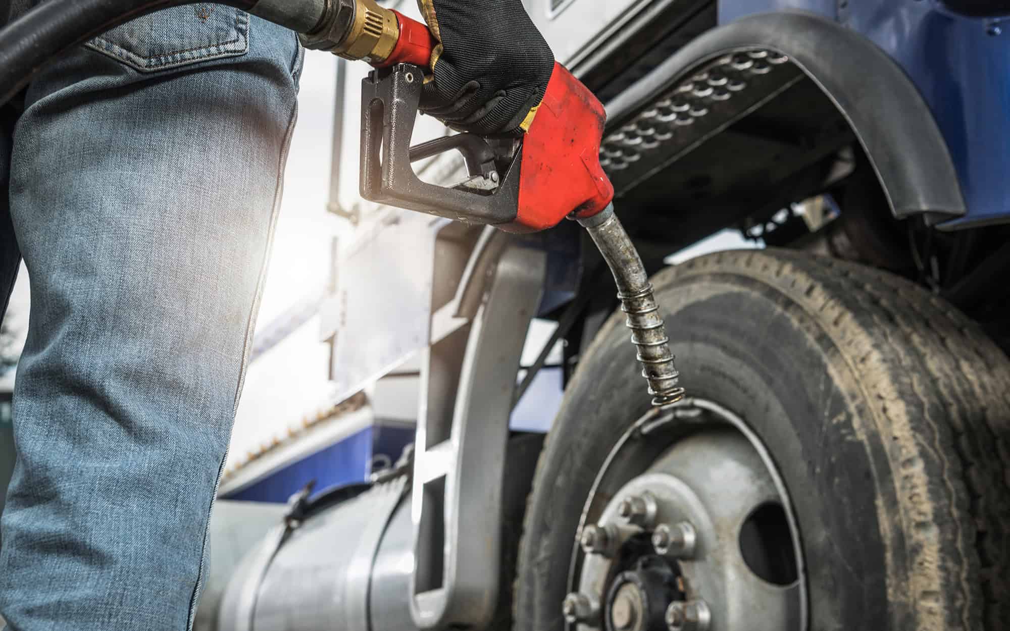 Semi Truck Driver About to Refuel His Tractor Truck with Diesel Fuel